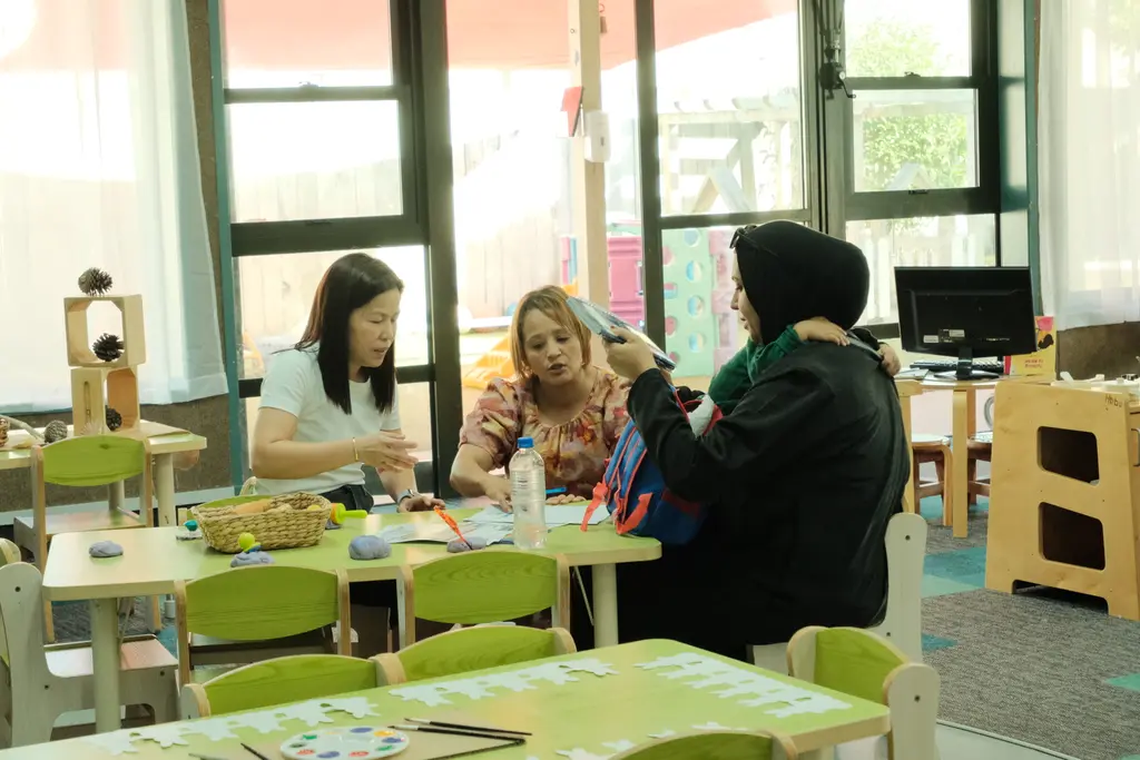 Children and families exploring one of the Paramount Grove learning spaces during the open day.