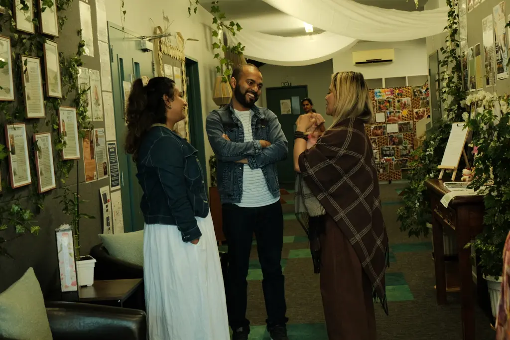 Open day visitors moving through one of Paramount Grove's indoor environments.