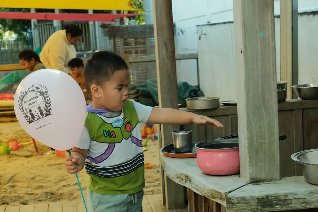 Families connecting with the Paramount Grove team during the open day.