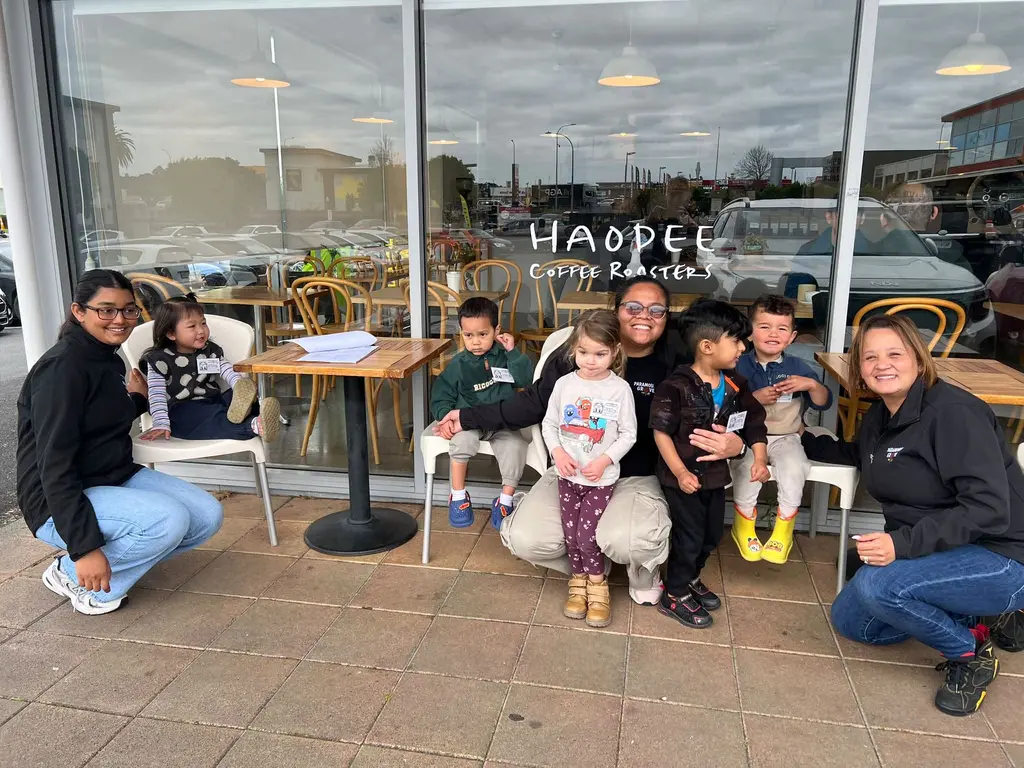 Tamariki and kaiako gathered outside Haodee Coffee Roasters